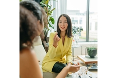 Woman who is holding a supplement